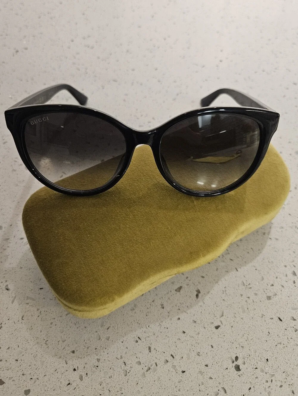 GUCCI womens Black Cat-Eye Sunglasses with Gradient Smoke Lenses